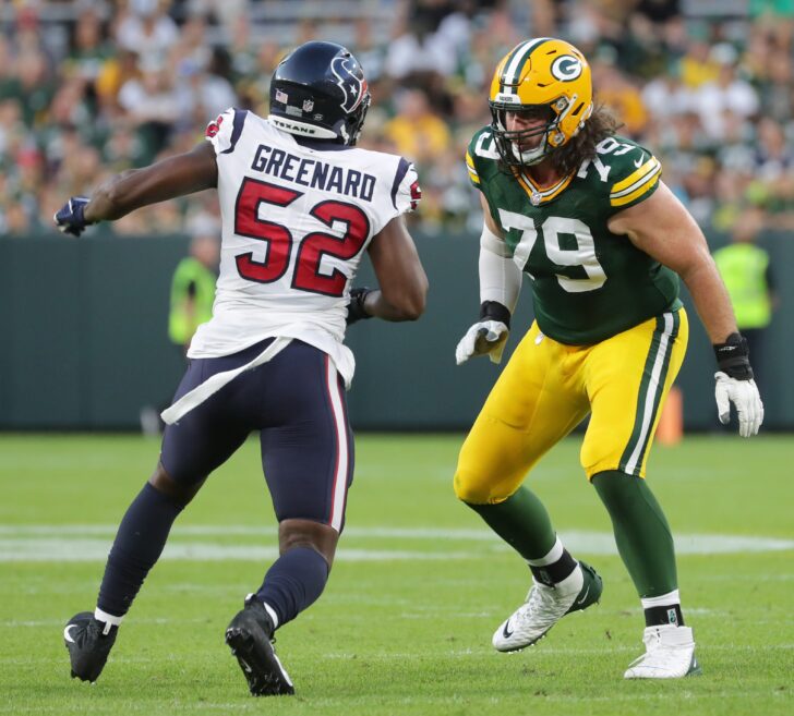 Green Bay Packers tackle Dennis Kelly (79) provides pass protection from Houston Texans defensive end Jonathan Greenard (52) during their preseason game Saturday, August 14, 2021 at Lambeau Field in Green Bay, Wis. The Houston Texans beat the Green Bay Packers 26-7