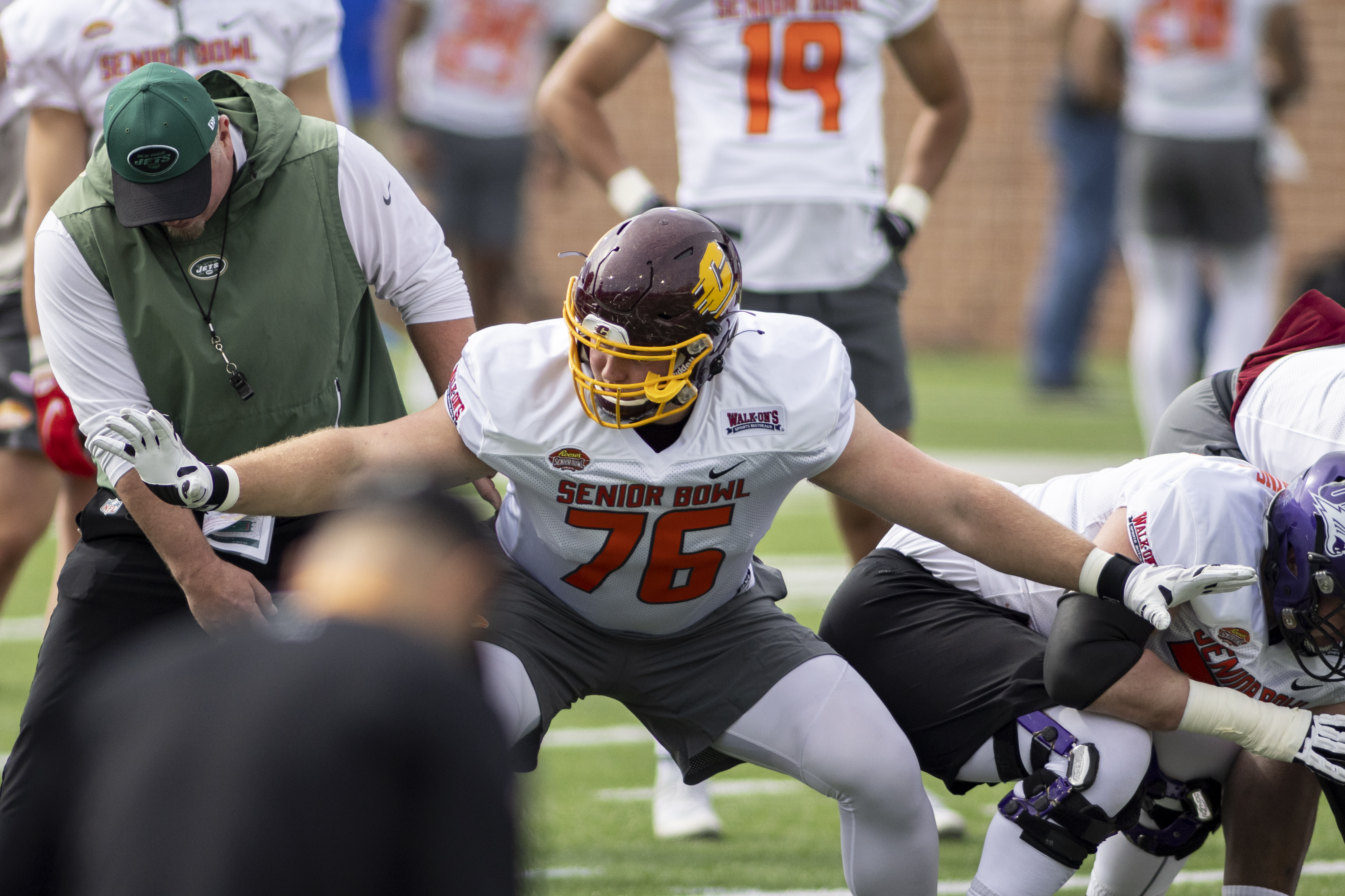 National offensive lineman Bernhard Raimann of Central Michigan (76) works with a coach during National practice for the 2022 Senior Bowl at Hancock Whitney Stadium. National offensive lineman Bernhard Raimann of Central Michigan (76) works with a coach during National practice for the 2022 Senior Bowl at Hancock Whitney Stadium.
