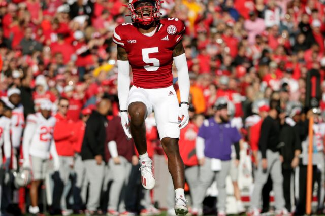 Nebraska Cornhuskers cornerback Cam Taylor-Britt (5) celebrates after successfully breaking up a pass intended for Ohio State Buckeyes wide receiver Chris Olave (2) during Saturday's NCAA Division I football game at Memorial Stadium in Lincoln, Neb., on November 6, 2021.