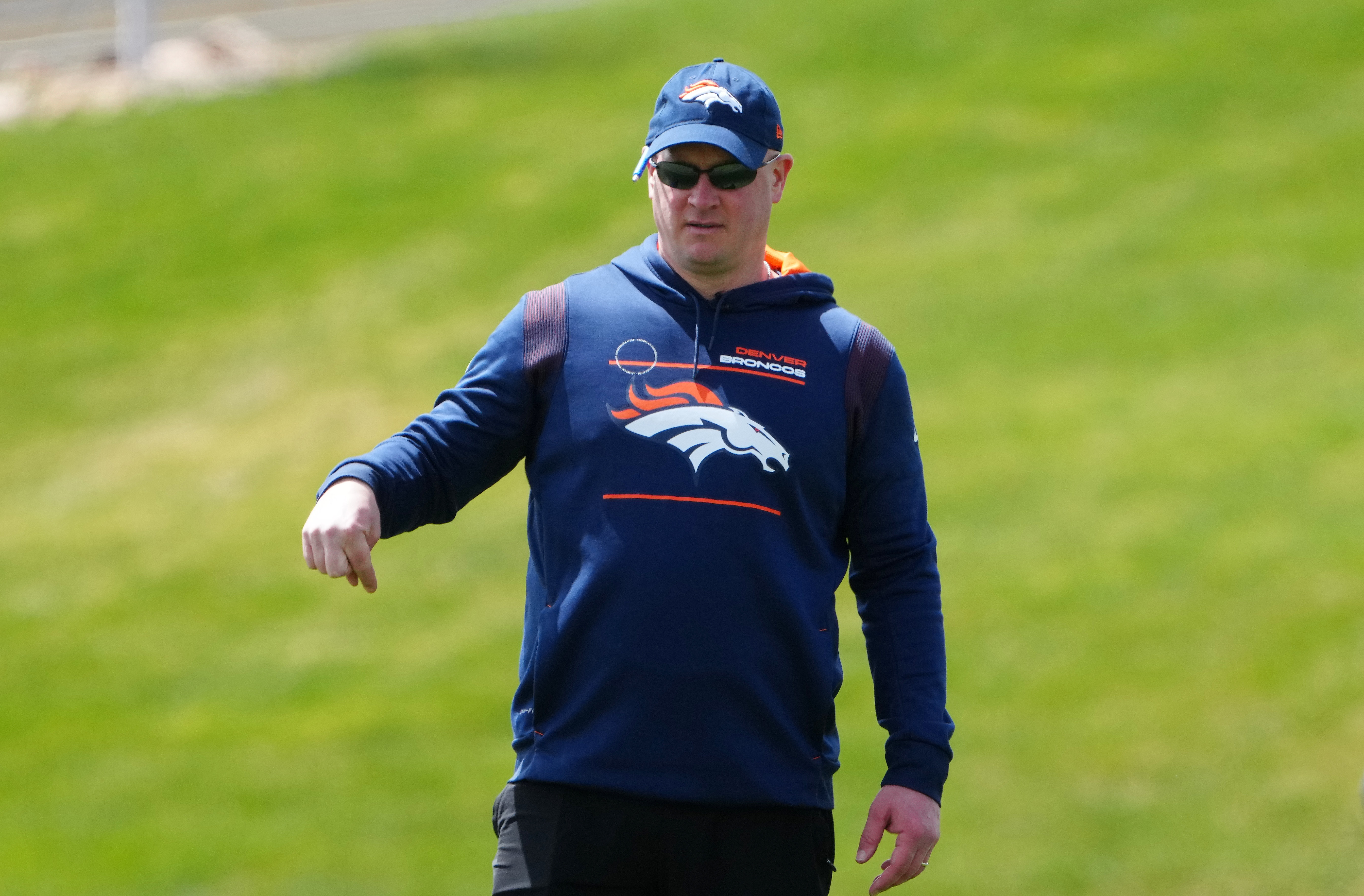 Denver Broncos head coach Nathaniel Hackett reacts during a Denver Broncos mini camp at UCHealth Training Center.