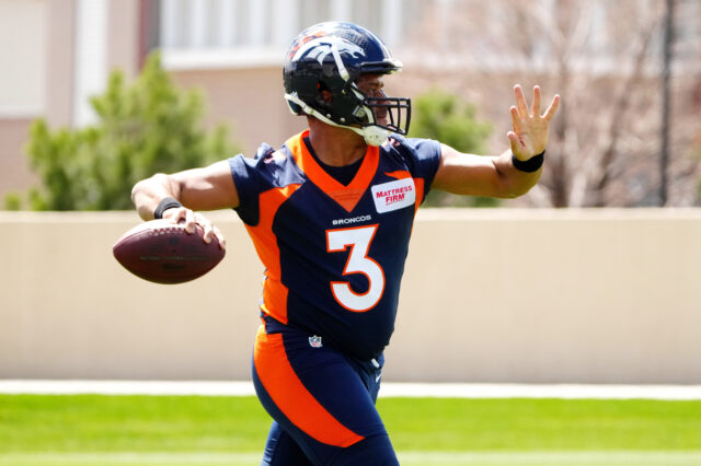 Denver Broncos quarterback Russell Wilson (3) works out during a Denver Broncos mini camp at UCHealth Training Center.