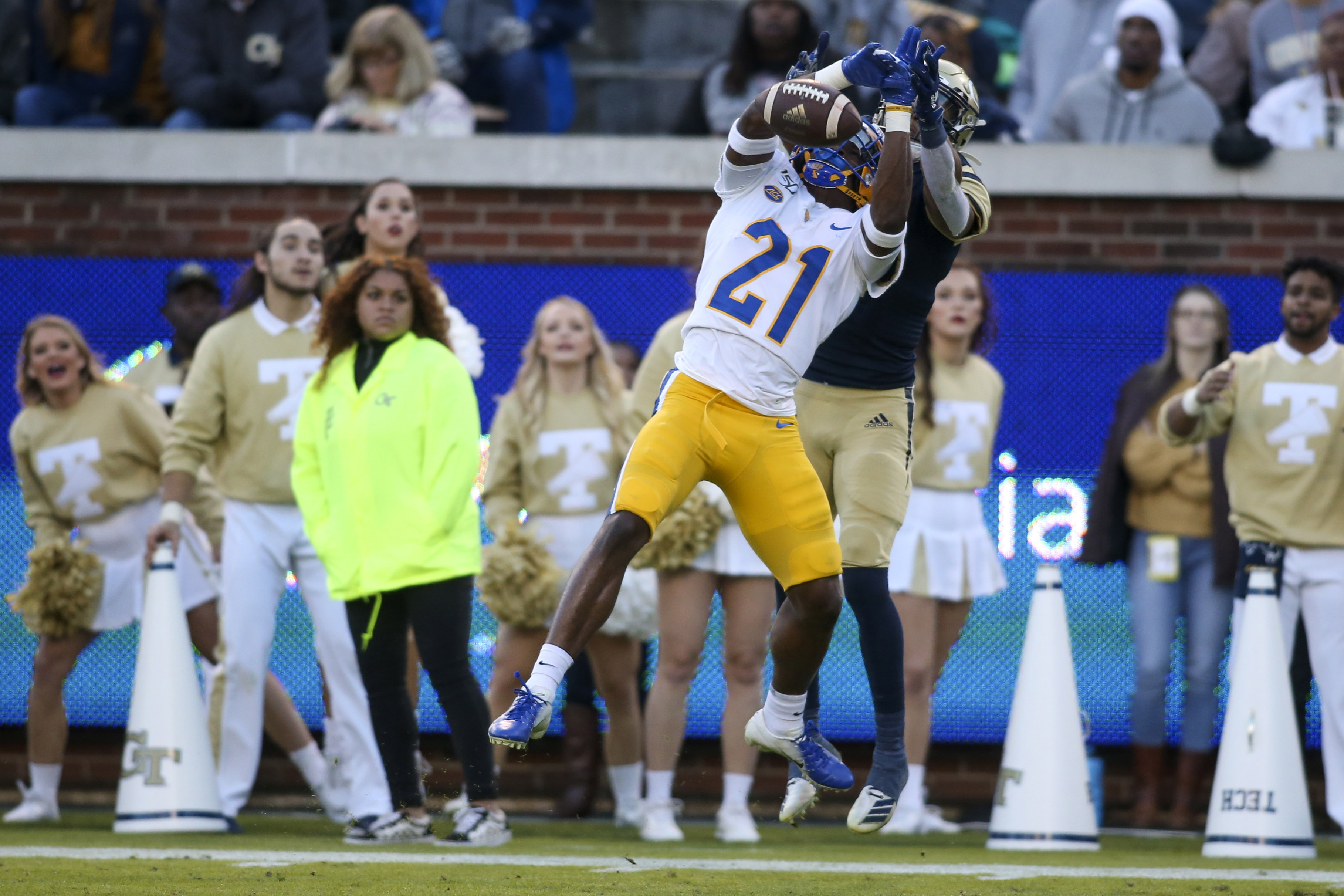 Pittsburgh Panthers defensive back Damarri Mathis (21) breaks up a pass intended for Georgia Tech Yellow Jackets quarterback Tobias Oliver (8) in the third quarter at Bobby Dodd Stadium.
