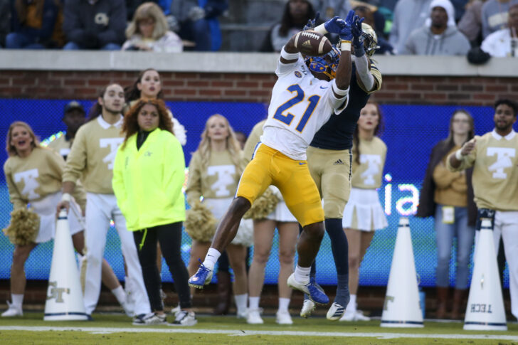 Pittsburgh Panthers defensive back Damarri Mathis (21) breaks up a pass intended for Georgia Tech Yellow Jackets quarterback Tobias Oliver (8) in the third quarter at Bobby Dodd Stadium.