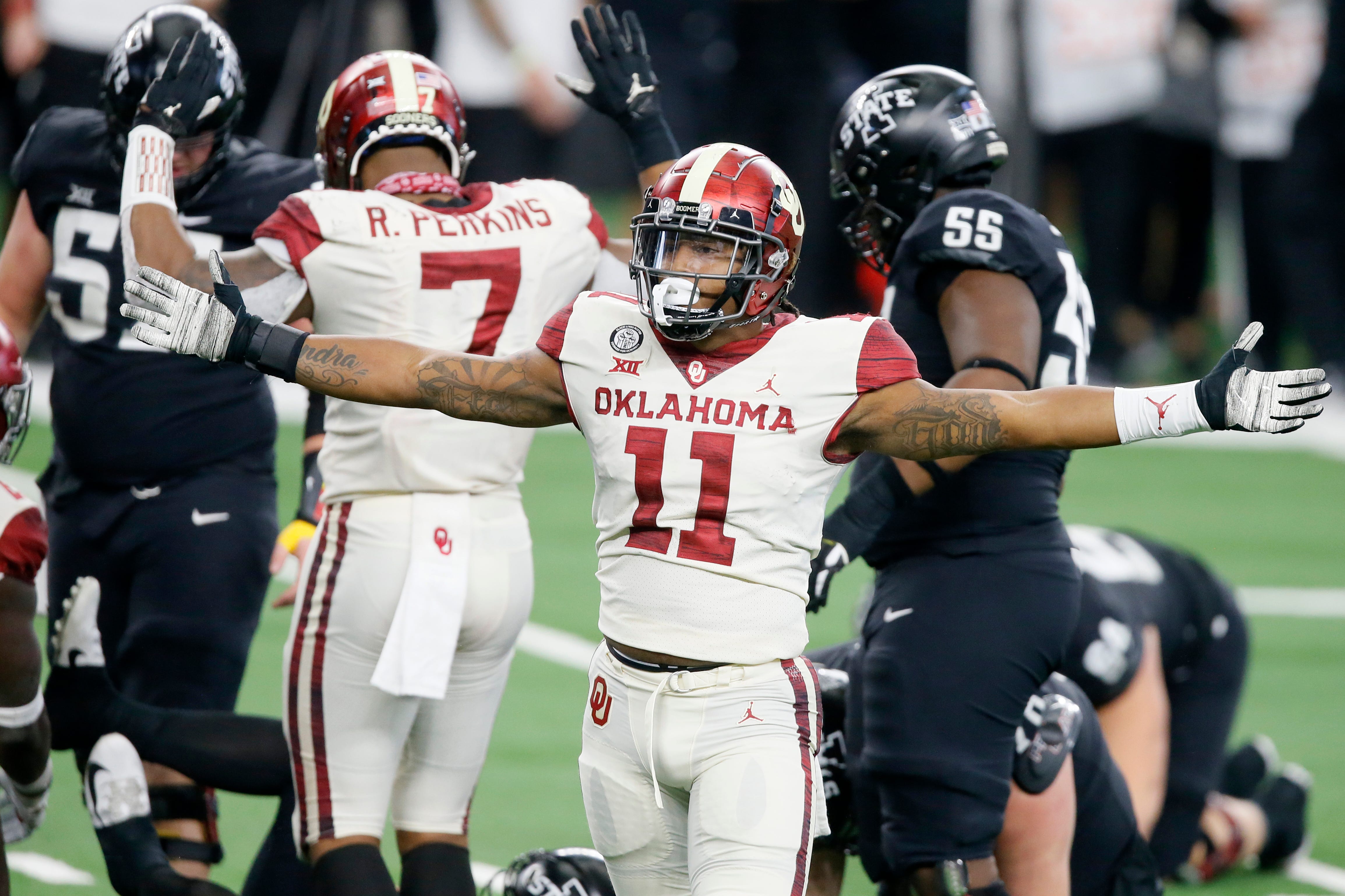 OU's Nik Bonitto (11) celebrates after a sack during the Big 12 Championship Game against Iowa State last Dec. 19 at AT&T Stadium in Arlington, Texas.