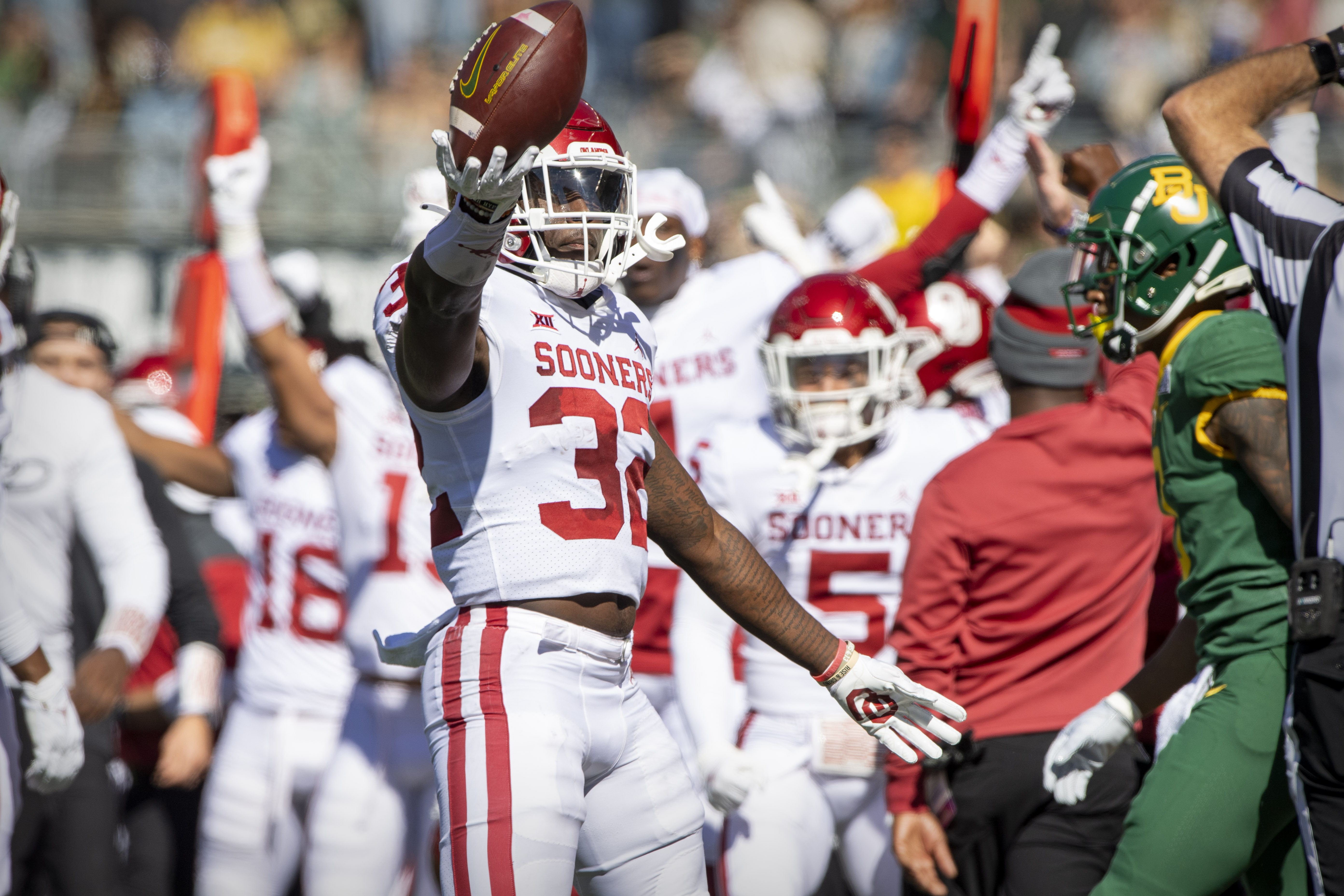 Oklahoma Sooners safety Delarrin Turner-Yell (32) celebrates making an interception against the Baylor Bears during the first half at McLane Stadium. 