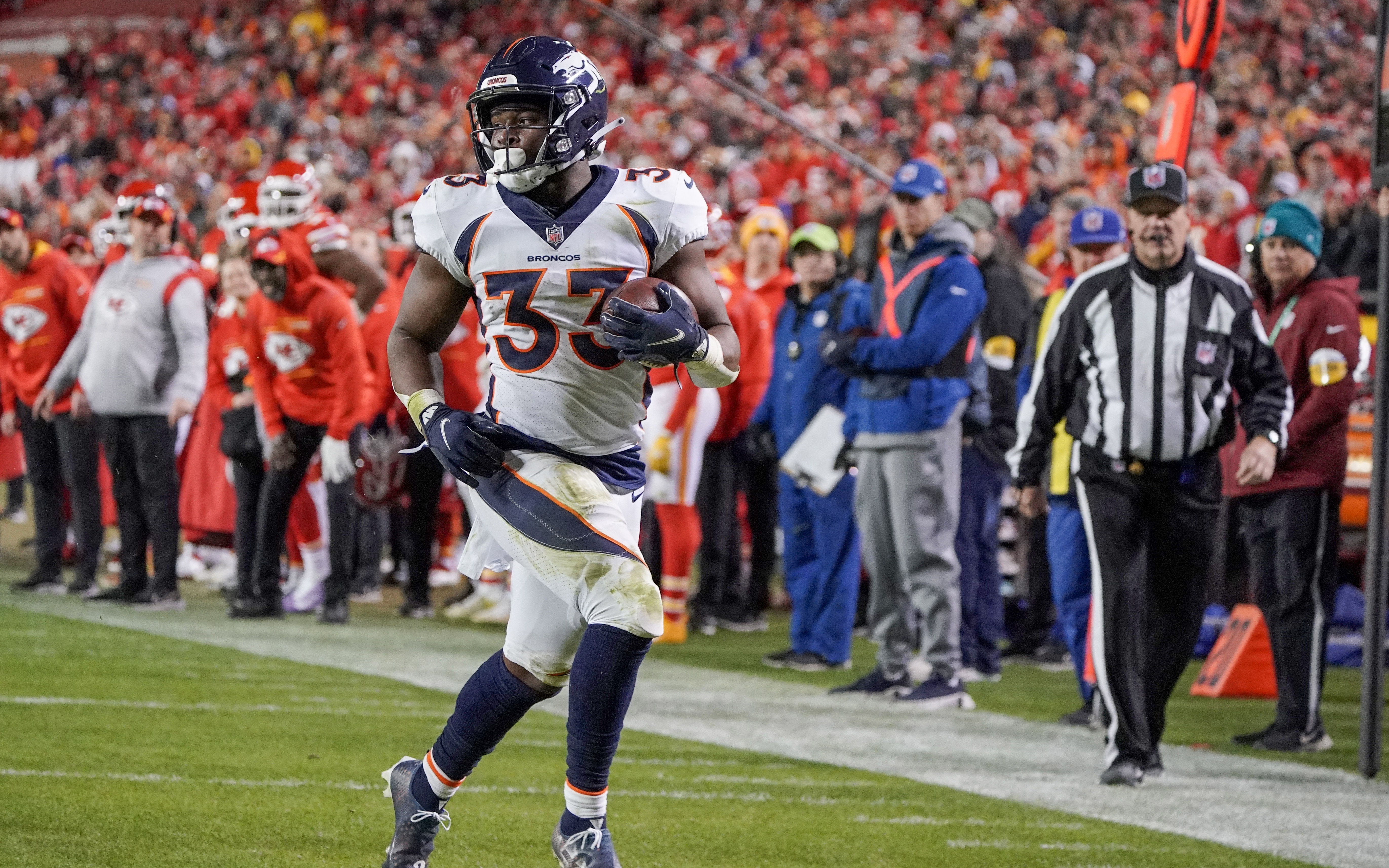 Javonte Williams scores a touchdown against the Chiefs. Credit: Denny Medley, USA TODAY Sports.