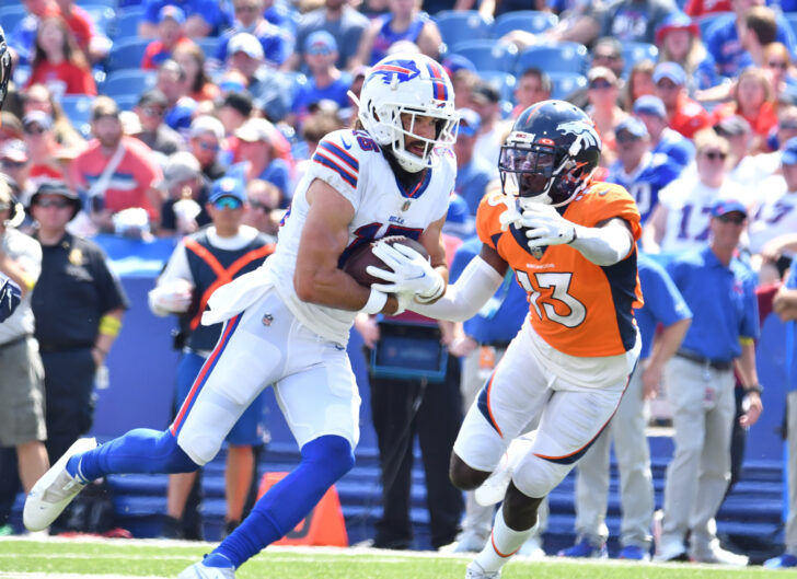 Buffalo Bills wide receiver Jake Kumerow (15) turns upfield after a catch as Denver Broncos cornerback Michael Ojemudia (13) looks to make a tackle in the second quarter of a pre-season game at Highmark Stadium. Mandatory Credit: Mark Konezny-USA TODAY Sports