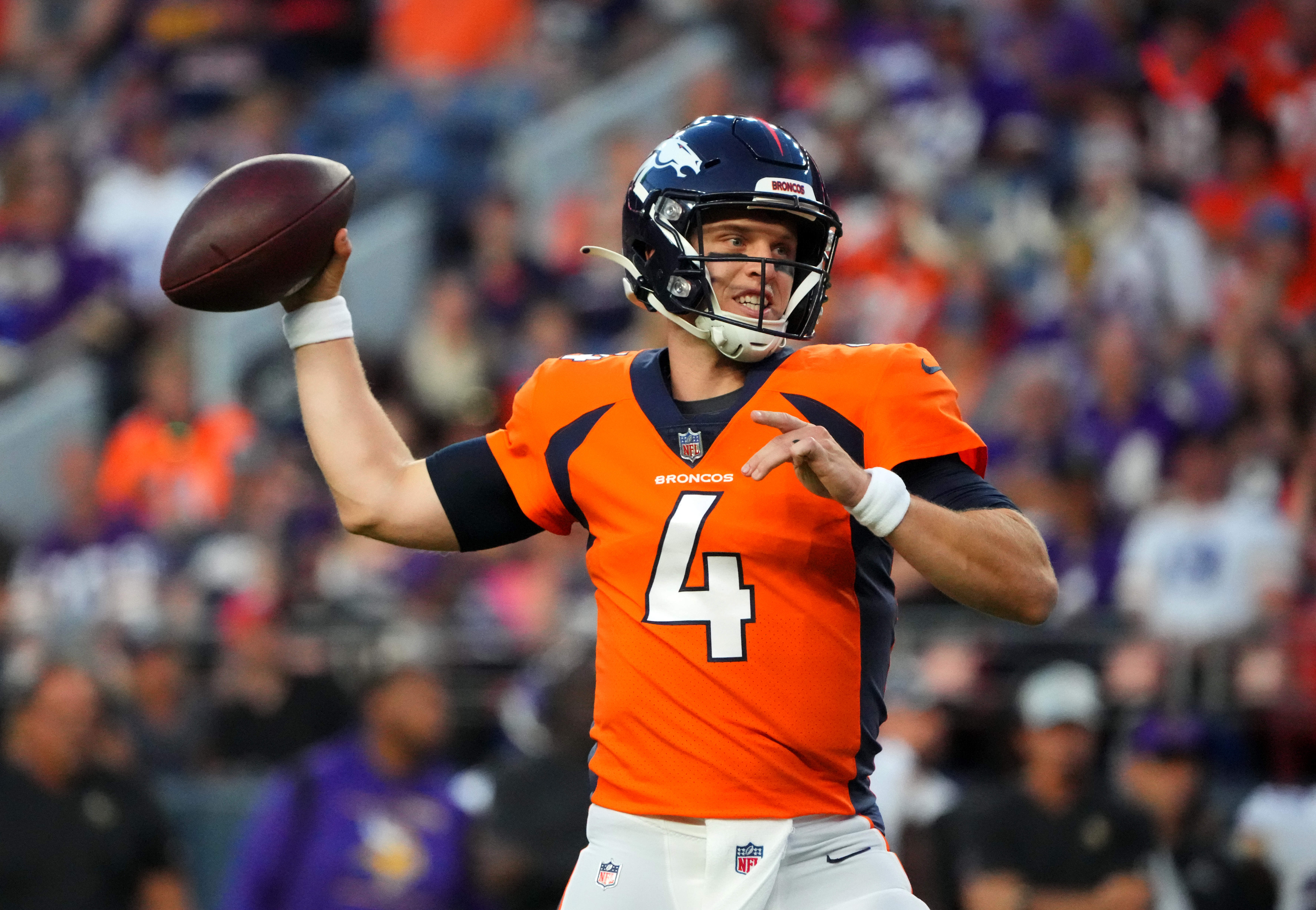 Denver Broncos quarterback Brett Rypien (4) prepares to pass the ball the ball in the first quarter against the Minnesota Vikings at Empower Field at Mile High.