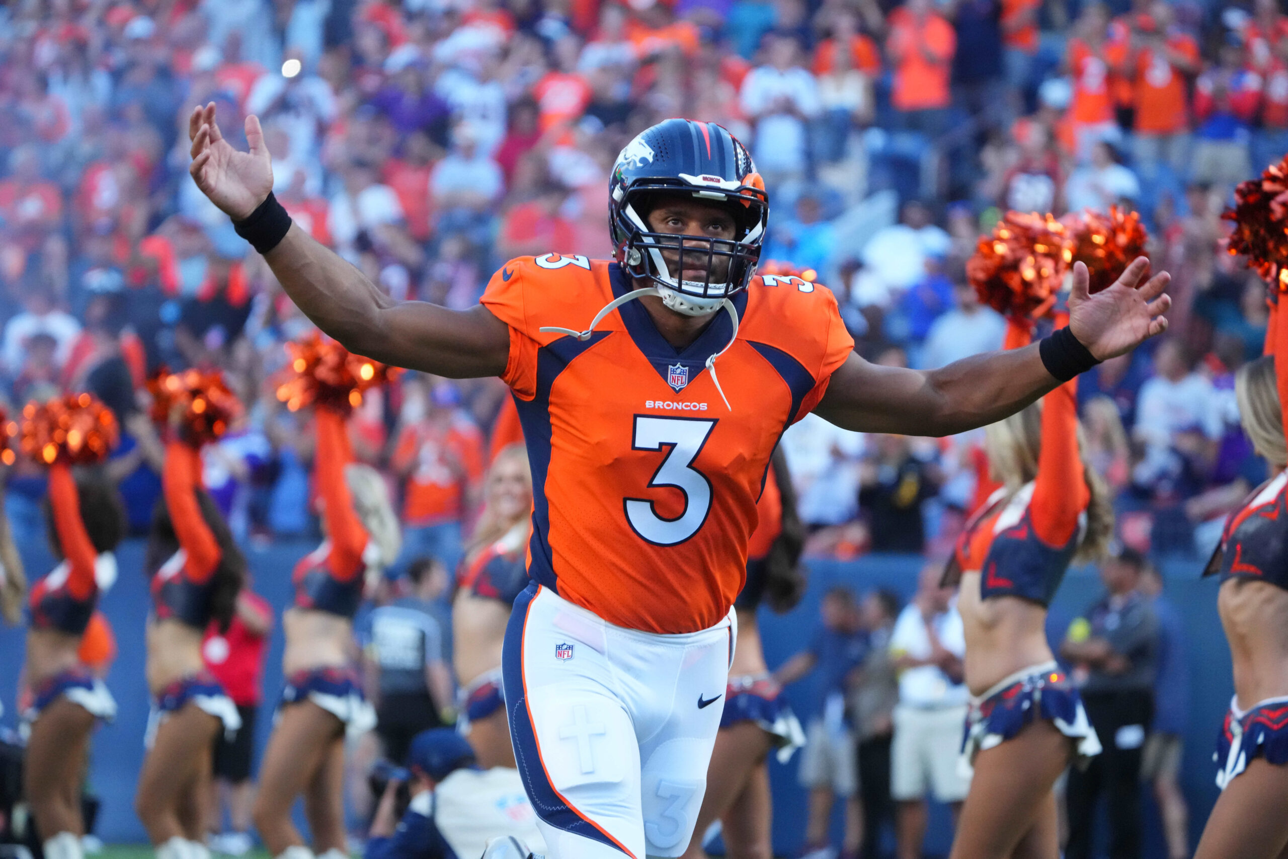 INGLEWOOD, CA - DECEMBER 25: Denver Broncos quarterback Russell Wilson (3)  rolls out during the Denver Broncos vs Los Angeles Rams at Sofi Stadium on  Stock Photo - Alamy