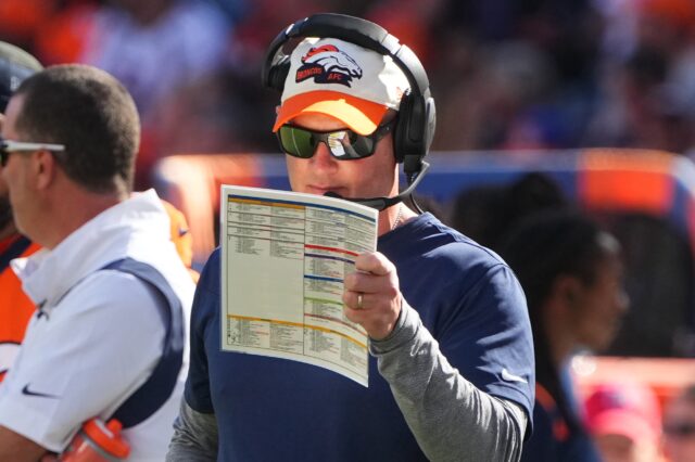 Nathaniel Hackett calling plays in the win over Houston on Sunday, Sept. 18 2022. Credit: Ron Chenoy, USA TODAY Sports. Denver Broncos