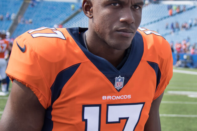 Denver Broncos punter Corliss Waitman (17) leaves the field after a pre-season game against the Buffalo Bills at Highmark Stadium.