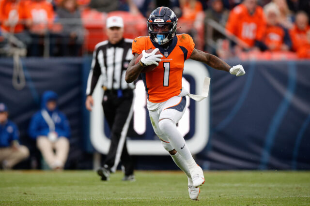 Denver Broncos wide receiver K.J. Hamler (1) runs the ball in the third quarter against the New York Jets at Empower Field at Mile High.