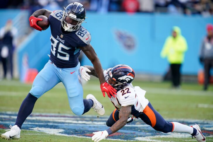 Tennessee Titans tight end Chigoziem Okonkwo (85) gets away from Denver Broncos safety Kareem Jackson (22) during the fourth quarter at Nissan Stadium