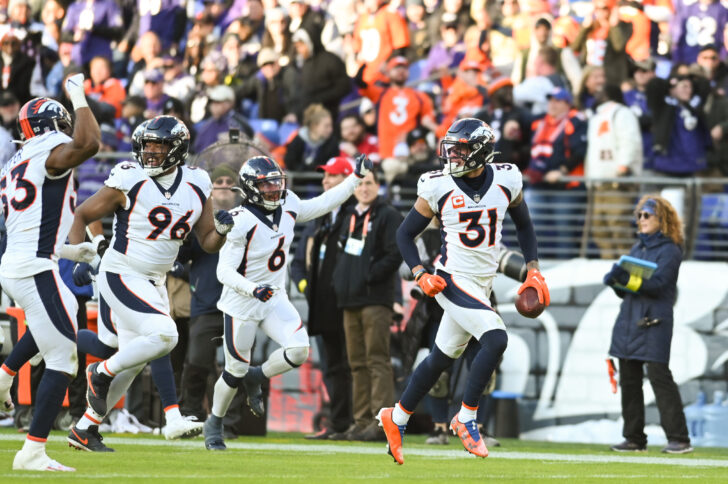 Denver Broncos safety Justin Simmons (31) celebrates after intercepting the Baltimore Ravens during the second half at M&T Bank Stadium.