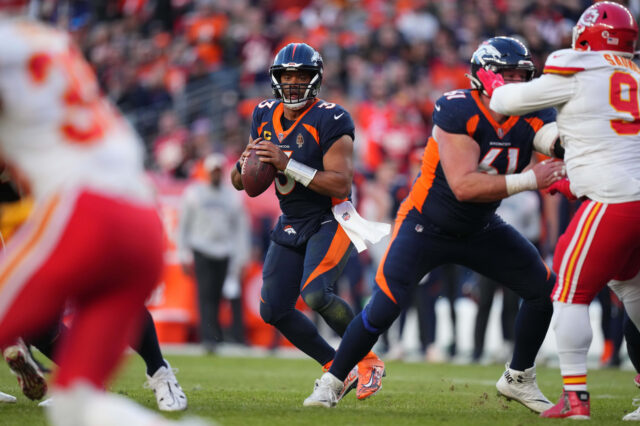 Denver Broncos quarterback Russell Wilson (3) prepares to pass the ball in the second quarter against the Kansas City Chiefs at Empower Field at Mile High.