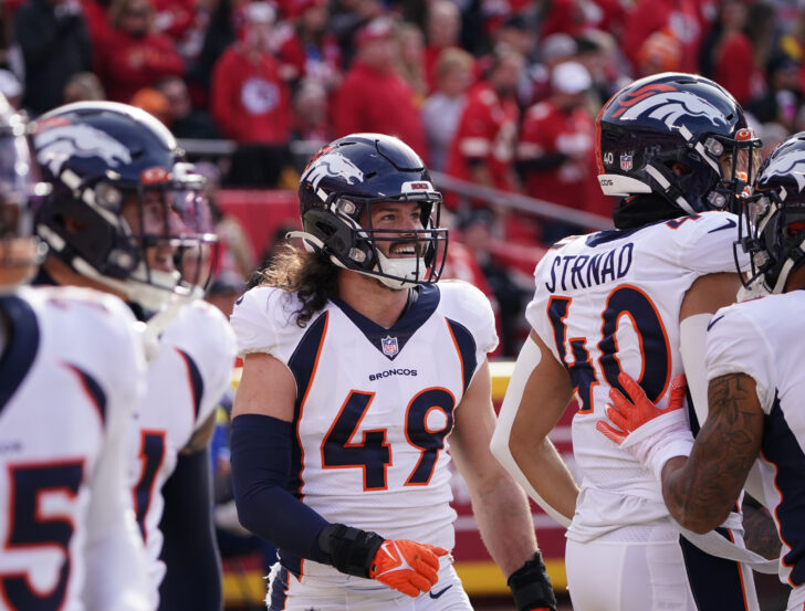 Denver Broncos linebacker Alex Singleton (49) celebrates with team mates after a fumble recovery against the Kansas City Chiefs during the first half at GEHA Field at Arrowhead Stadium.