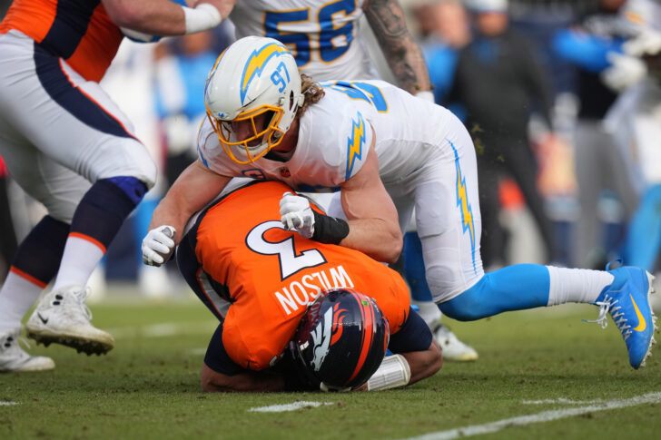 Los Angeles Chargers linebacker Joey Bosa (97) sacks Denver Broncos quarterback Russell Wilson (3) in the second quarter at Empower Field at Mile High. 