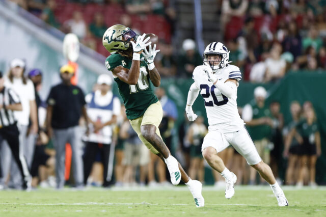 South Florida Bulls wide receiver, and recent Coach Prime commit, Xavier Weaver (10) catches a pass during the first half against the Brigham Young Cougars at Raymond James Stadium.