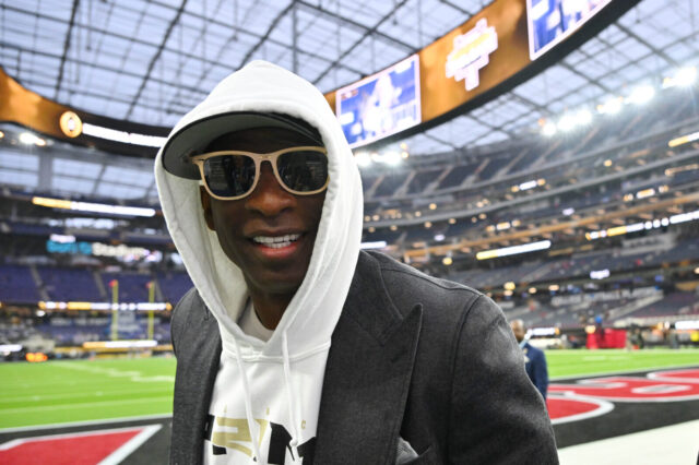 Deion Sanders (Coach Prime) in attendance before the CFP national championship game between the TCU Horned Frogs and Georgia Bulldogs at SoFi Stadium.