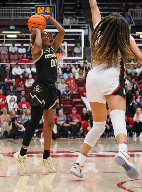 Colorado Buffaloes guard Jaylyn Sherrod (00) scores a three point basket against Stanford Cardinal guard Haley Jones (30) at the buzzer during the second quarter at Maples Pavilion.