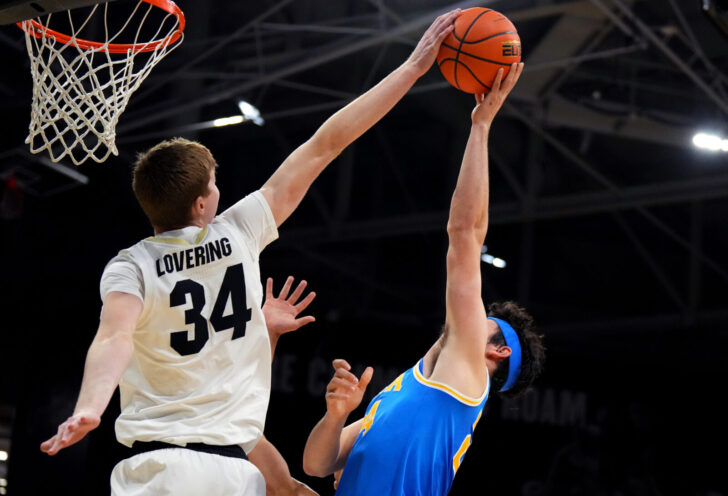 Colorado Buffaloes center Lawson Lovering (34) blocks UCLA Bruins guard Jaime Jaquez Jr. (24) in the second half at th
