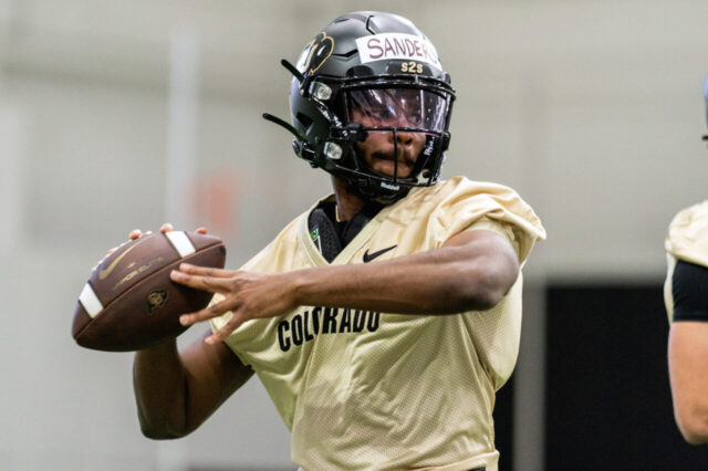 CU Buffs quarterback Shedeur Sanders drops back to pass the ball during Colorado Buffaloes Spring Practice.