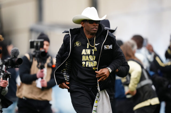 Colorado Buffaloes head coach Deion Sanders hits the field before the start of the spring game at Folsom Field.