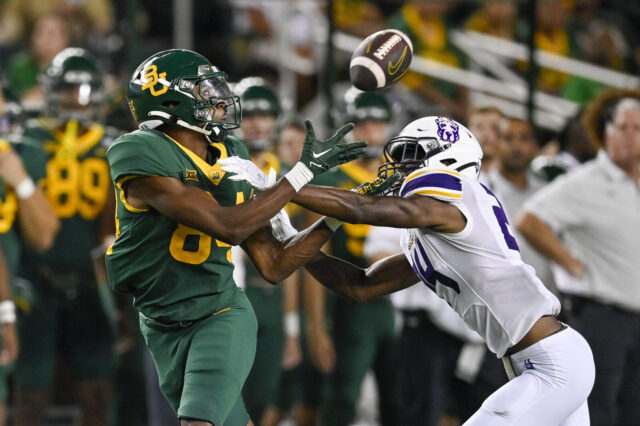 Colorado Buffaloes wide receiver Jaylen Ellis (84) catches a pass for a first down as Albany Great Danes defensive back Elijah Ayers (24) defends during the second half at McLane Stadium.
