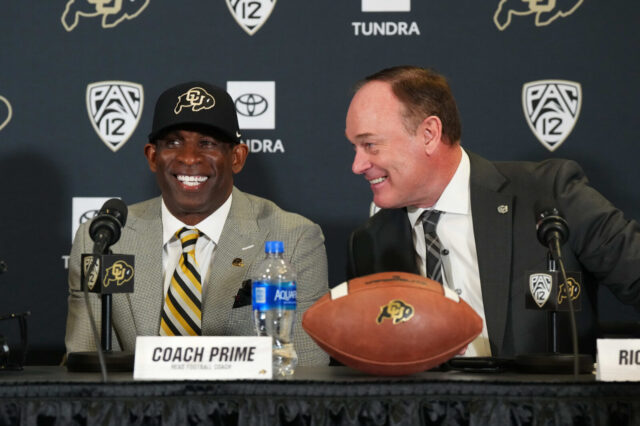 Colorado Buffaloes head coach Deion Sanders and athletic director Rick George during a press conference at the Arrow Touchdown Club.