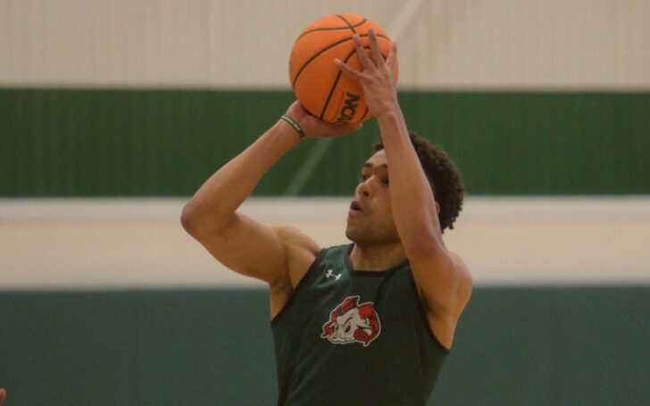 Javonte Johnson shoots a basketball at CSU practice.