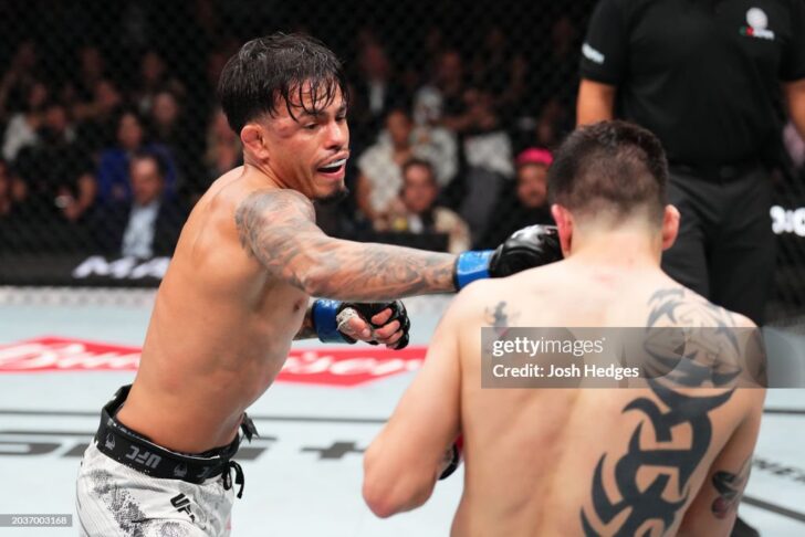 MEXICO CITY, MEXICO - FEBRUARY 24: (L-R) Brandon Royval punches Brandon Moreno of Mexico in a flyweight fight during the UFC Fight Night event at Arena CDMX on February 24, 2024 in Mexico City, Mexico. (Photo by Josh Hedges/Zuffa LLC via Getty Images)