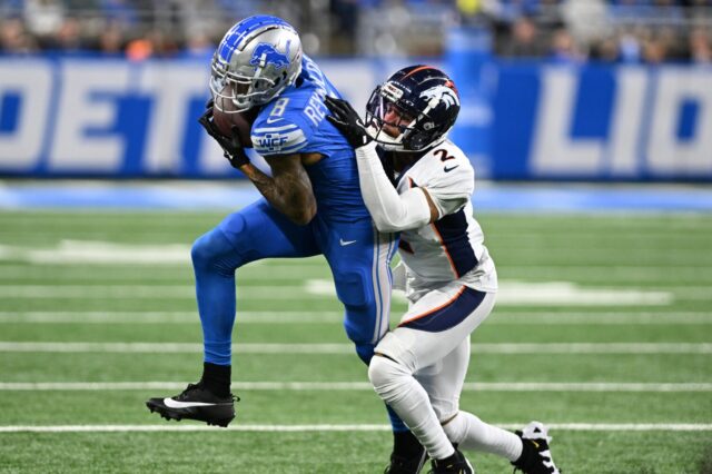 Broncos wide receiver Josh Reynolds catches on Patrick Surtain while still with the Lions.