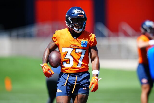R.J. Harvey in Denver Broncos rookie minicamp. He's wearing 37 and a helmet with "HARVEY" written on tape.